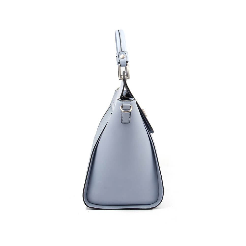 Powder blue winged tote bag with lace overlay and gold hardware detail
