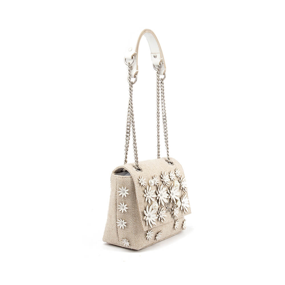 Women's mini flap bag with 3D flower appliqués and pearl bead detail on natural linen