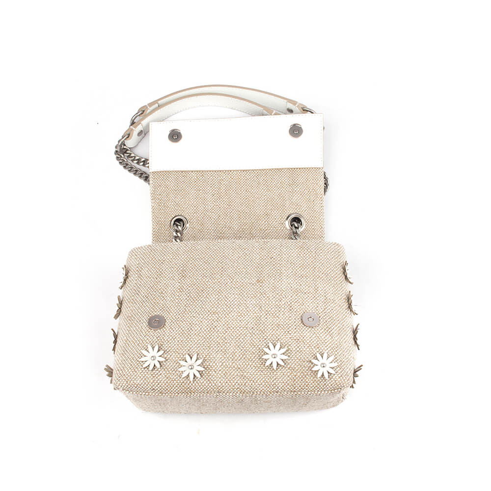 Embellished floral mini bag in natural raffia with pearl centers and logo charm
