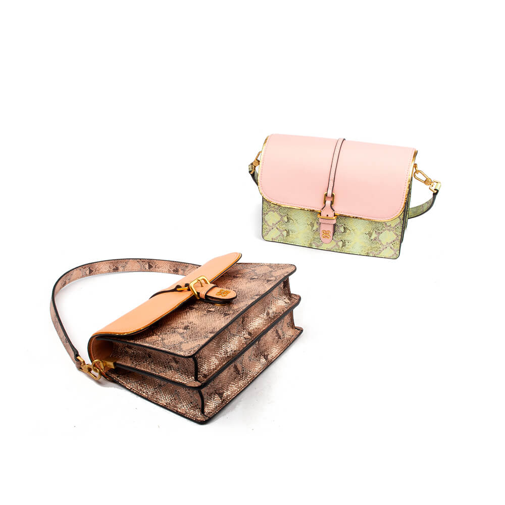 Two-tone flap shoulder bag with adjustable strap and signature logo emblem