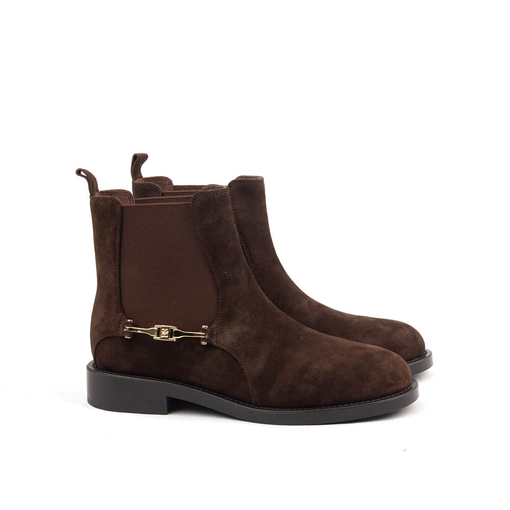 Dark brown suede ankle boots with gold bar detail and elastic gusset