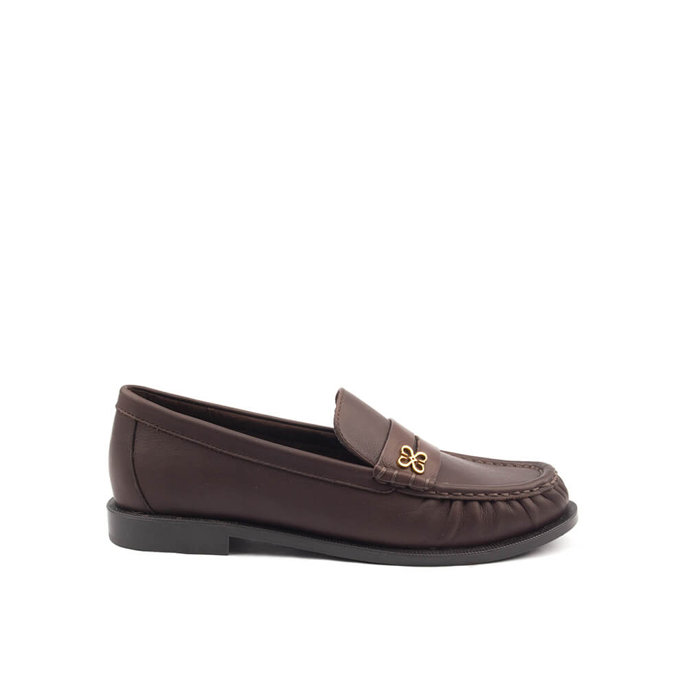 Women's dark chocolate leather penny loafers with gold floral logo