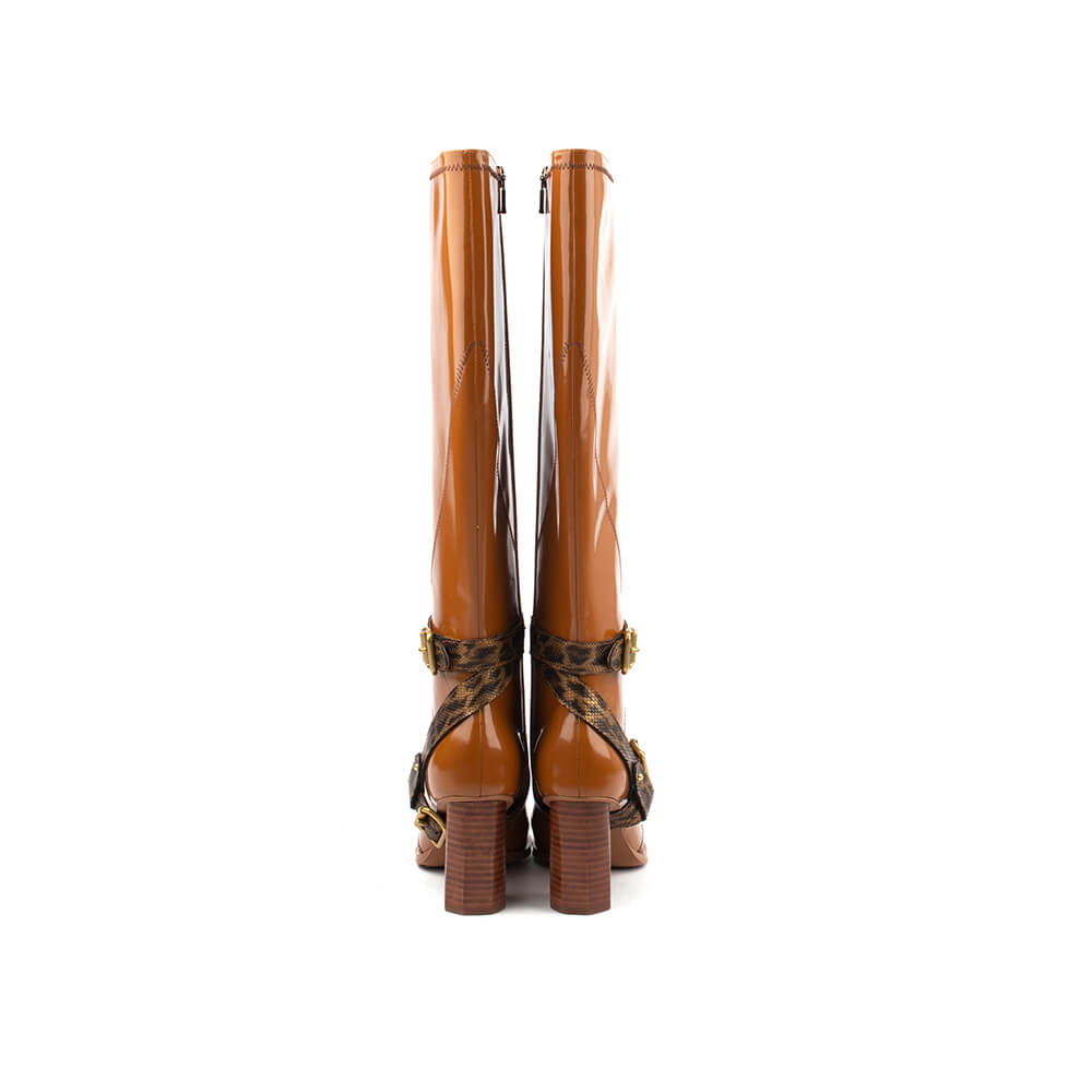 Amber patent leather tall boots with double leopard strap and gold buckles