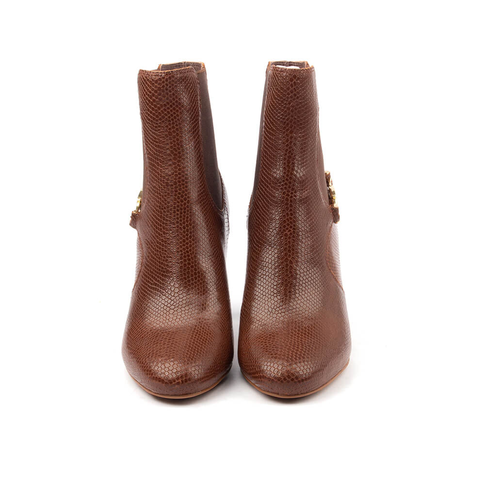Women's snake-print Chelsea boots in warm toffee brown with gold logo hardware