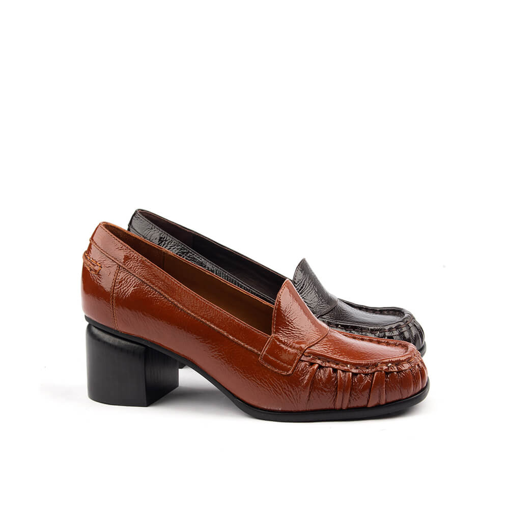 Crinkled amber patent loafers with ruched toe and black rubber sole women