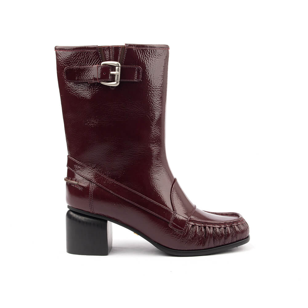 Women's bordeaux crinkled patent leather mid-calf moccasin boots with silver buckle strap