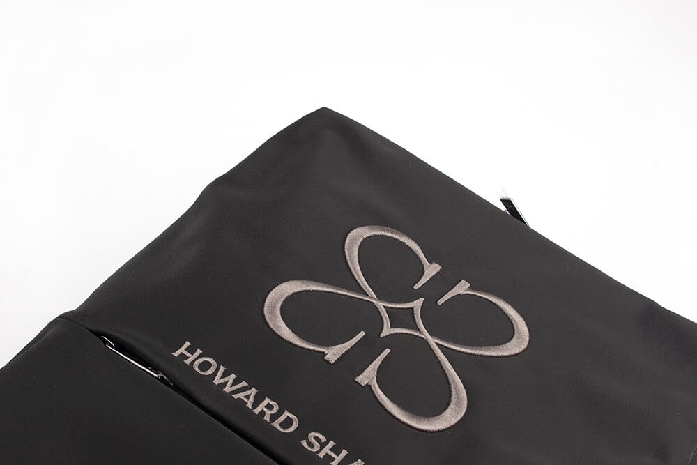 Howard Shawn everyday black nylon backpack with front zip pocket and logo detail