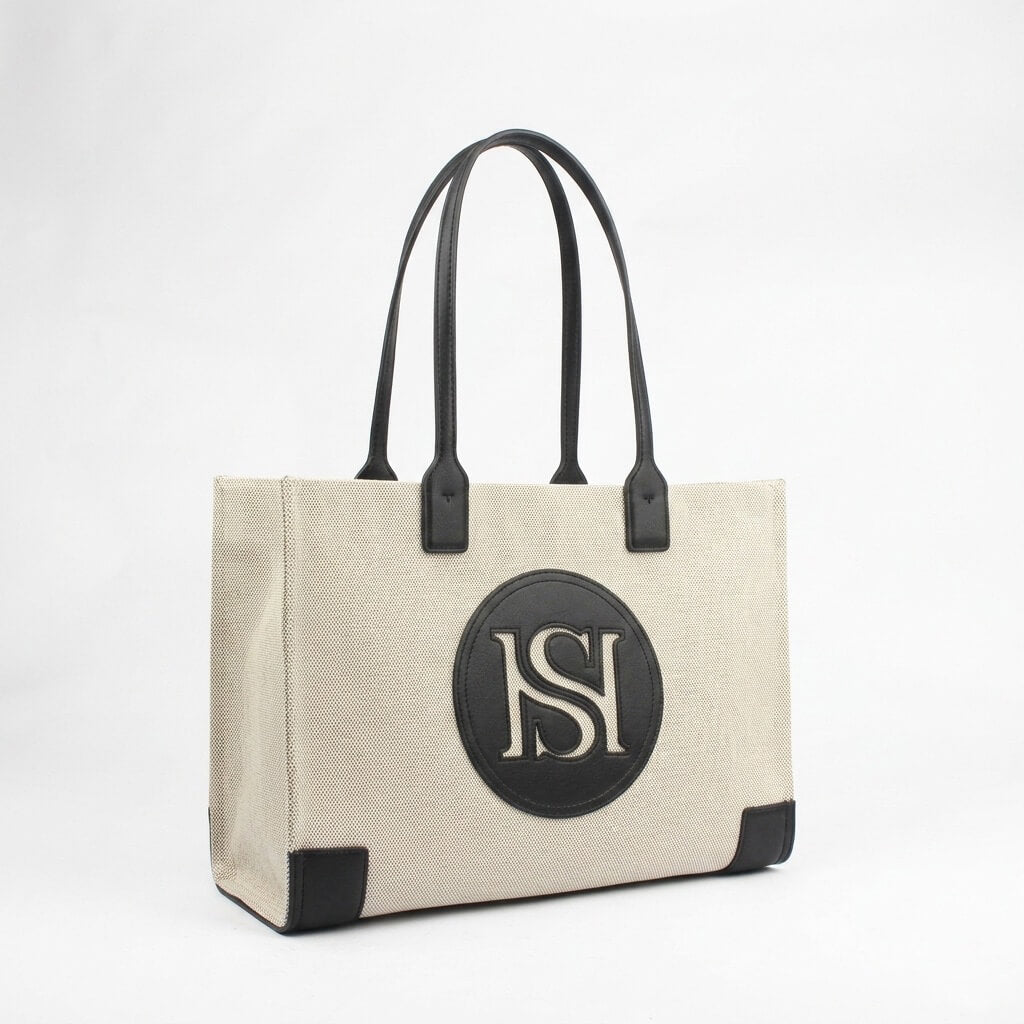 Howard Shawn large canvas tote black leather handles circular HS patch